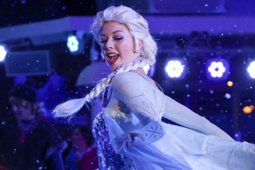 actor dressed as elsa for frozen birthday party