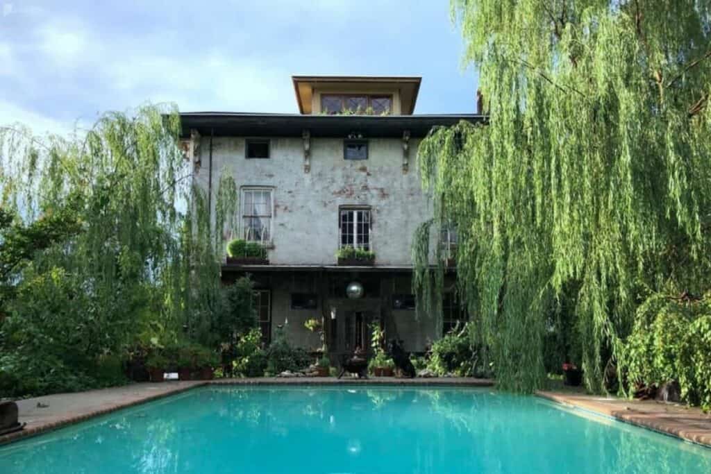 a historic mansion with pool